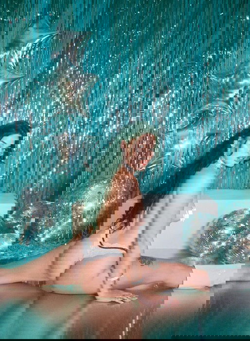 Woman in her knickers doing the splits