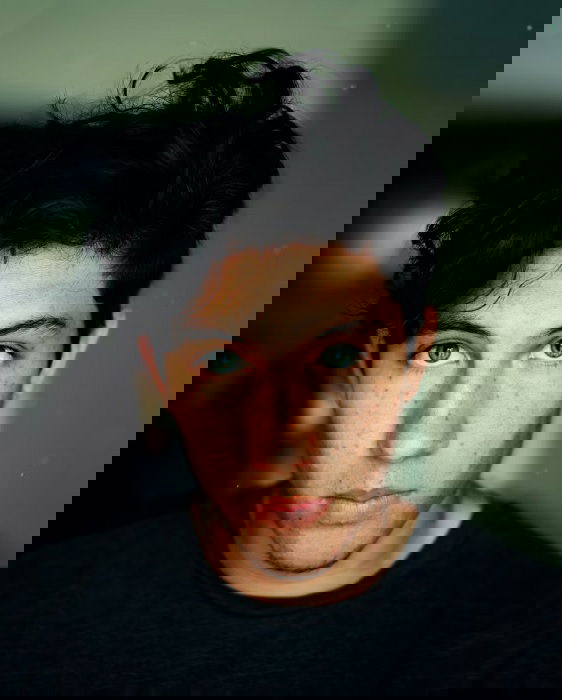 Portrait of young man with green eyes
