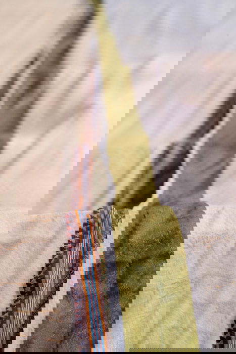 Close-up photo of a fabric with colorful stripes